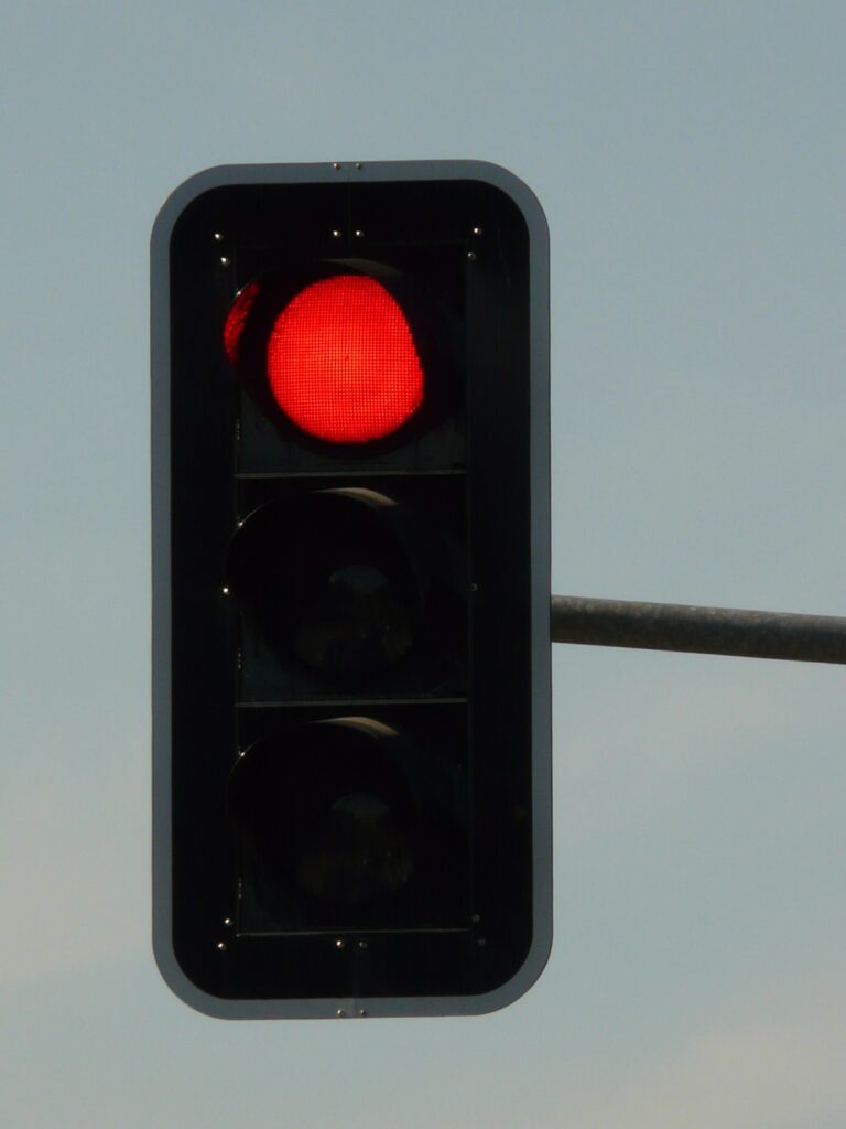red light symbolizing buyers pausing